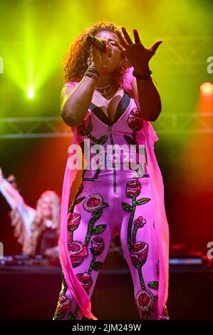 Kelis Rogers-Mora, commonly known as Kelis, performs her hit song Milkshake at Tramlines Festival in Sheffield. Stock Photo