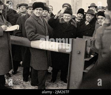 Nikita Khrushchev and Walter Ulbricht inspect the border crossing on Berlin's Friedrichstrasse, known as Checkpoint Charlie on J. Museum: PRIVATE COLLECTION. Author: ANONYMOUS. Stock Photo