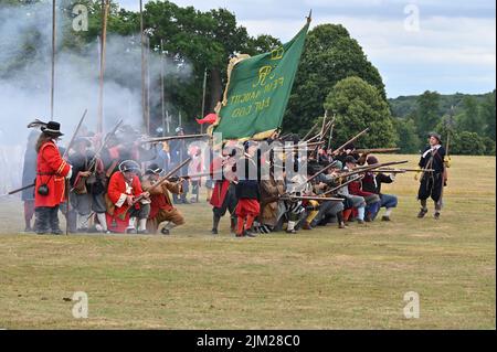 Members of the Sealed Knot Society re-enact a skirmish of part of the Monmouth Rebellion in the grounds of Blenheim Palace, Woodstock, Oxfordshire Stock Photo