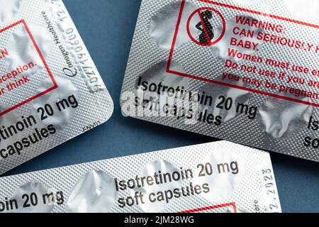 LONDON, UK - August 2022: packs of isotretinoin or roaccutane tablets used to treat severe acne Stock Photo