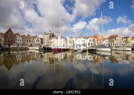 Goes - View to very cute Marina with awsome  reflections on the water, Zeeland, Netherlands, 21.03.2018 Stock Photo
