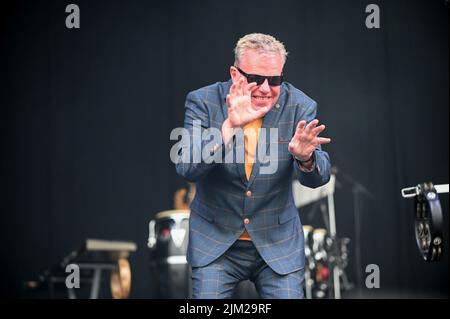 Lead Singer, Graham McPherson, known by his stage name Suggs, performs all the Hits with his Band Madness at Tramlines Festival in Sheffield. Stock Photo