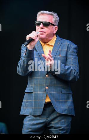 Lead Singer, Graham McPherson, known by his stage name Suggs, performs all the Hits with his Band Madness at Tramlines Festival in Sheffield. (Photo by Robin Burns / SOPA Images/Sipa USA) Stock Photo