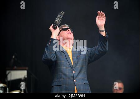 Lead Singer, Graham McPherson, known by his stage name Suggs, performs all the Hits with his Band Madness at Tramlines Festival in Sheffield. (Photo by Robin Burns / SOPA Images/Sipa USA) Stock Photo