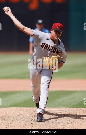 CLEVELAND, OH - AUGUST 3: Arizona Diamondbacks relief pitcher Kevin Ginkel (37) pitches against the Cleveland Guardians on August 3, 2022 at Progressive Field in Cleveland, Ohio. (Joe Robbins/Image of Sport) Stock Photo