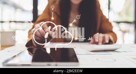 Technology concept. Business woman using cloud application on digital tablet. Stock Photo