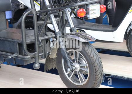 Front side view of a small goods or cargo carrying electric scooter Stock Photo