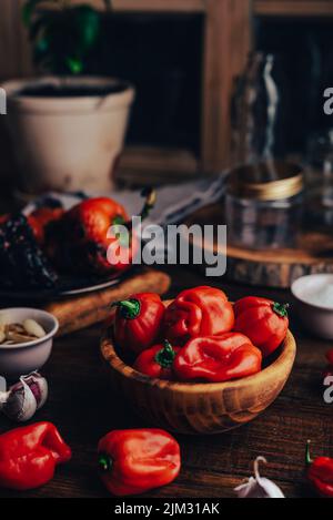 Red Habanero Peppers and Other Ingredients for Hot Chili Sauce Stock Photo