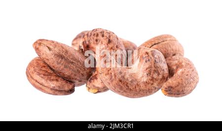 Cashew nuts in shell isolated on white background. Roasted and salted cashew nuts. Clipping path Stock Photo