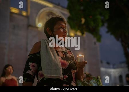 Merida, Yucatan, Mexico. 3rd Aug, 2022. August 3, 2022, Merida, Mexico: Maria mother of Jose Eduardo placed an altar in San Juan park, located in the center of the city of Mérida, to commemorate the death of her son. Maria and acquaintances prayed the rosary to Jose Eduardo, in the San Juan park located in the center of Merida, before leaving for the government palace. on August 3, 2022 in Merida, Mexico. (Photo by Mariana Gutiérrez/Eyepix Group (Credit Image: © Mariana Gutierrez/eyepix via ZUMA Press Wire) Stock Photo