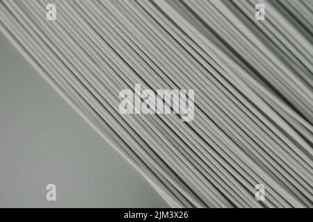 A closeup of many plastic sticks in black and white Stock Photo