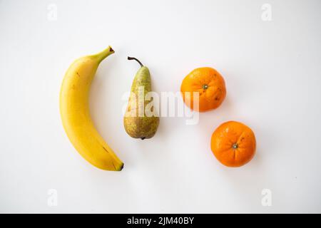 A closeup of various fruits isolated on white background. Stock Photo