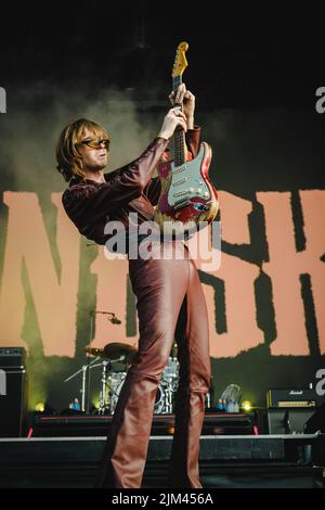 Stockholm, Sweden. 01st, July 2022. The Italian glam rock band Måneskin performs a live concert during the Swedish music festival Lollapalooza Stockholm 2022 in Stockholm. Here guitarist Thomas Raggi is seen live on stage. (Photo credit: Gonzales Photo - Tilman Jentzsch). Stock Photo