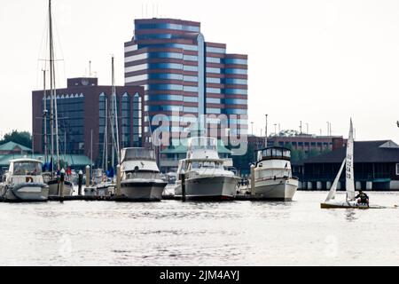 Hampton Virginia,Tidewater Area,Hampton River water,marina boats boating harbor harbour yachts office buildings city skyline,scene in a photo Stock Photo