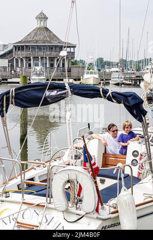 Hampton Virginia,Tidewater Area,Hampton River water,marina boats boating harbor harbour yacht sailboat father son man boy,landmark Stock Photo