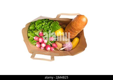 Fruits, vegetables and products in a paper grocery bag Stock Photo