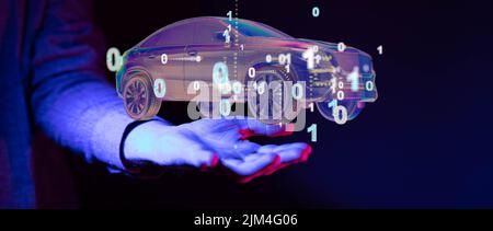A closeup of a hand holding an illustrated futuristic car on a neon background Stock Photo