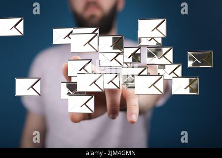 A person presenting the virtual projection of the email marketing concept with digital envelopes Stock Photo
