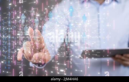 A person presenting a virtual projection of artificial intelligence Stock Photo