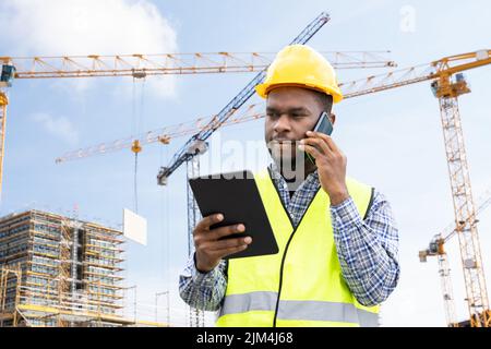 African American Engineer Worker. Building Architect Business Call Stock Photo