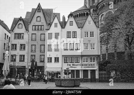 banks of the rhine in the old town of cologne, well frequented pubs and cafes Stock Photo