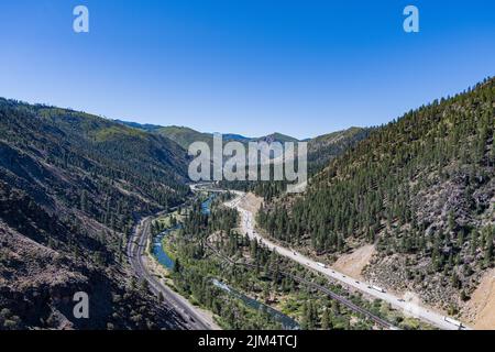 Interstate 80 and the Union Pacific Railroad crosses the Truckee River in northern California. Stock Photo