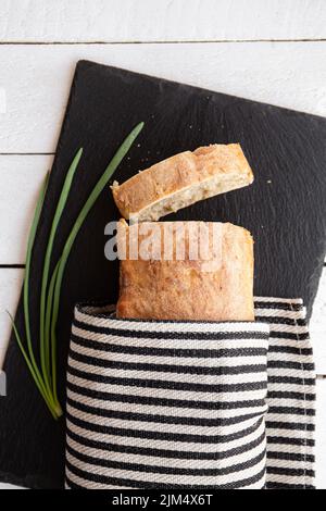 Premium Photo  Freshly baked loaf of a wheat sourdough bread with marks  from bread proofing basket in enameled cast iron dutch oven.