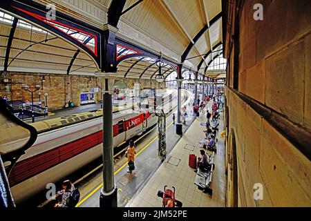 Newcastle Central Rail Station with the LNER express and passengers travelling on to London Kings Cross Stock Photo