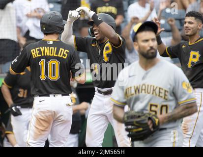 Pittsburgh Pirates left fielder Bryan Reynolds (10) flips his bat after  striking out against the Milwaukee Brewers during the sixth inning of a  baseball game Wednesday, April 20, 2022, in Milwaukee. (AP