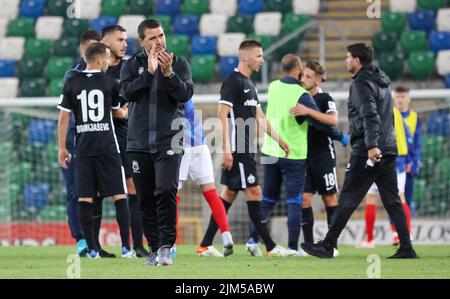 Windsor Park, Belfast, Northern Ireland, UK. 04 Aug 2022. UEFA Europa League Third Qualifying Round  (first leg) – Linfield v FC Zurich. Action from tonight's game at Windsor Park (Linfield in blue). Linfield manager David Healy salutes the Linfield supportres after the game. Credit: CAZIMB/Alamy Live News. Stock Photo