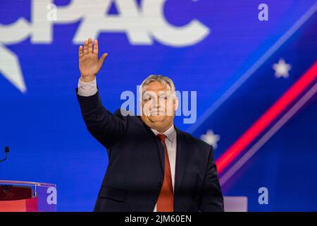 Dallas, Texas, USA. 4th Aug, 2022. Hungary Prime Minister VIKTOR ORBAN, waves to applause at the CPAC Texas 2022 at the Hilton Anatole. (Credit Image: © Chris Rusanowsky/ZUMA Press Wire) Stock Photo