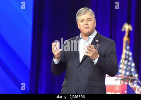 Dallas, TX, USA. 4th Aug, 2022. (NEW) Sean Hannity delivers remarks at the Conservative Political Action Conference 2022 in Dallas, Texas. August 4, 2022, Dallas, TX, USA: Sean Hannity, Fox News TV host, delivers remarks during the Conservative Political Action Conference (CPAC), held in Texas, in United States, on Thursday (4). The conference which goes on till Sunday (07), is broadcast live on the CPAC website and online on Fox Nation and it focuses on immigration, the border, the left gender and policies being pushed by democrats in the United States and also on the war in Ukraine and Russ Stock Photo