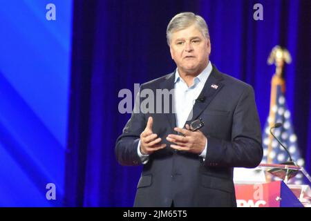 Dallas, TX, USA. 4th Aug, 2022. (NEW) Sean Hannity delivers remarks at the Conservative Political Action Conference 2022 in Dallas, Texas. August 4, 2022, Dallas, TX, USA: Sean Hannity, Fox News TV host, delivers remarks during the Conservative Political Action Conference (CPAC), held in Texas, in United States, on Thursday (4). The conference which goes on till Sunday (07), is broadcast live on the CPAC website and online on Fox Nation and it focuses on immigration, the border, the left gender and policies being pushed by democrats in the United States and also on the war in Ukraine and Russ Stock Photo