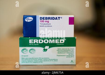 A closeup of Polish Erdomed and Debridat brand medicine in cartons on the table. Stock Photo