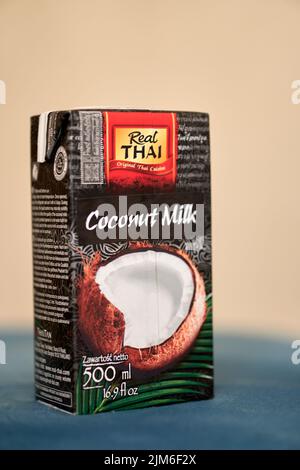 A vertical shot of a real Thai brand coconut milk in a box on a table Stock Photo