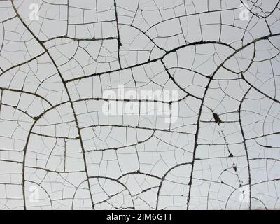 A cracked white ceramic tile background Stock Photo