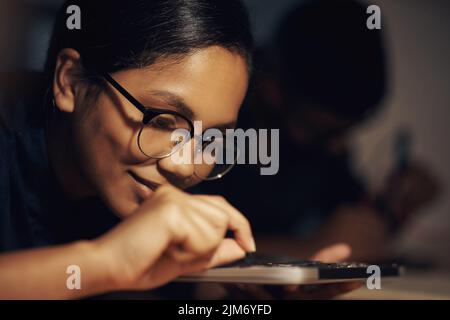 Your computer hardware is safe in her hands. a young technician repairing computer hardware. Stock Photo