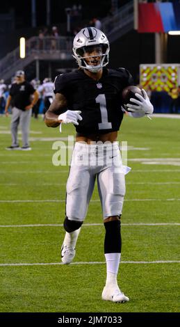 Las Vegas Raiders' Tyron Johnson (17) runs against the Los Angeles Chargers  during the first half of an NFL football game, Sunday, Jan. 9, 2022, in Las  Vegas. (AP Photo/Ellen Schmidt Stock