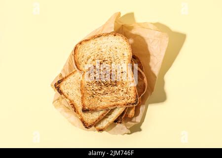 Stack of toasts on color background Stock Photo