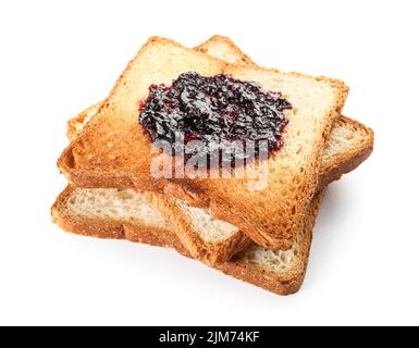 Stack of toasts with tasty jam on white background Stock Photo