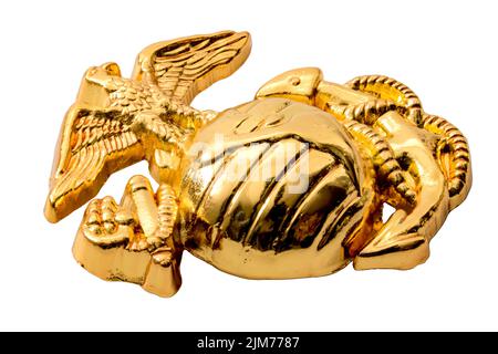 Insignia pin of United States Marine Corps or USMC isolated on white with clipping path cutout concept for American armed forces, Navy of the USA  and Stock Photo