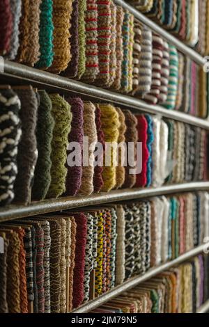 multi-colored braid on the counter of the store for decoration, sewing and needlework Stock Photo