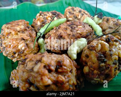 lento food from Indonesia. banana leaf background. close up shot outdoors. Stock Photo