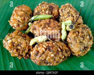 lento food from Indonesia. banana leaf background. close up shot outdoors. Stock Photo