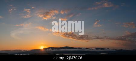 Panorama of a dramatic evening sky Stock Photo
