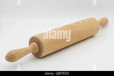 Wooden rolling pin isolated on white background Stock Photo