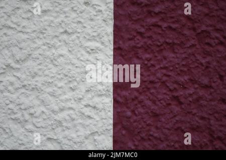 White (left) and red (right) painted plaster on house wall, use: texture, copy space, background, concept: maritime design (horizontal) Stock Photo
