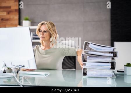 Digital Transformation. Accountant Using E Invoice Tax Document Software Stock Photo