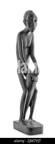 Wooden African statue of a skinny man working playing percussion, isolated on white Stock Photo