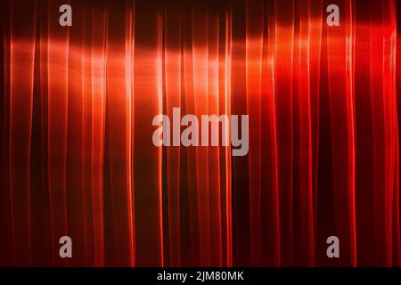 laser red lines creating a wall of light Stock Photo